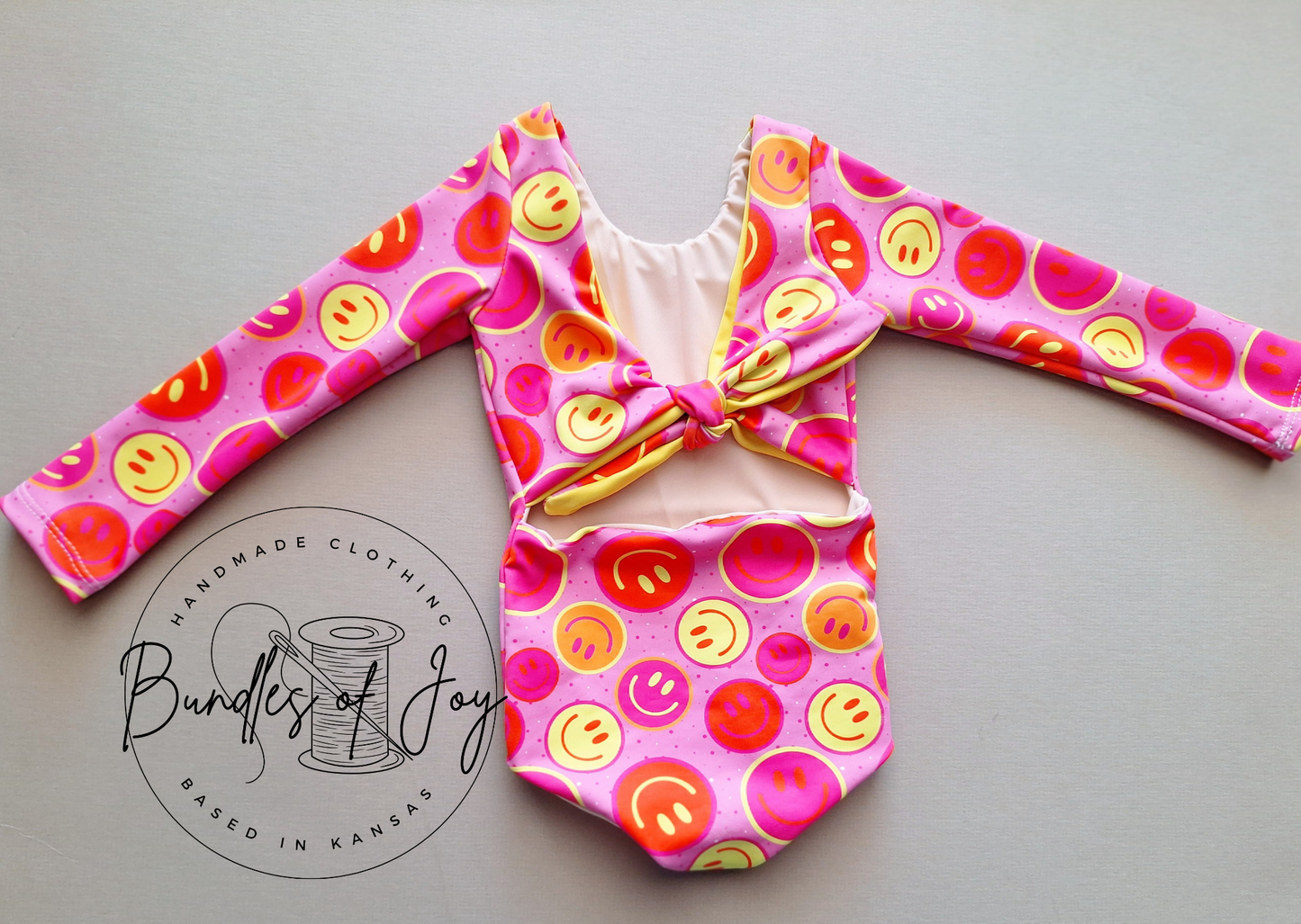 One piece tie back *reversible*