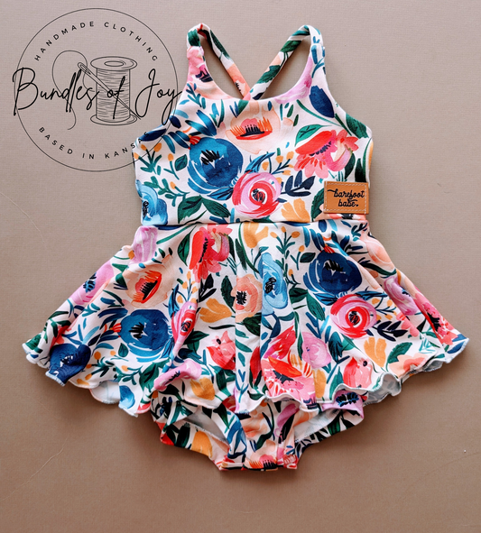 Cross back skirted romper